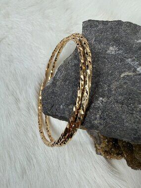 Pair of Twisted Gold Tone Bangle Bracelets 8.25"